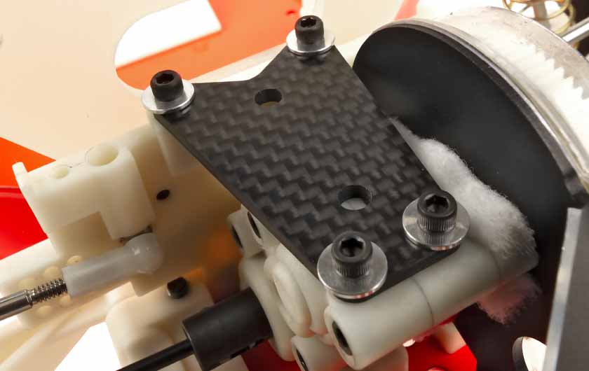 Motor is mounted on a black aluminum plate