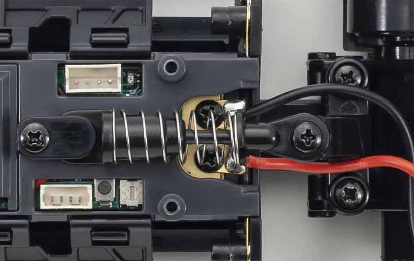 Rear suspension uses a single coil spring as a damper